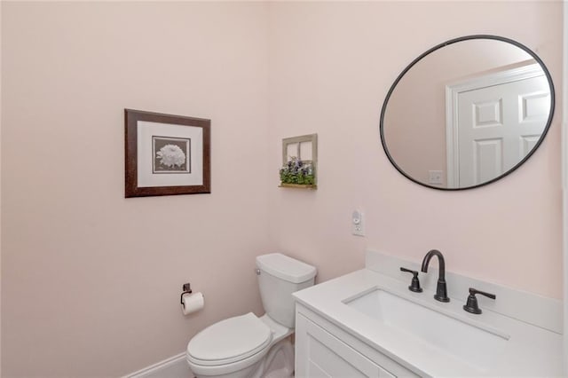 9102 Magnolia Ct, Spanish Fort, AL 36527 - bathroom featuring vanity, toilet, and baseboards