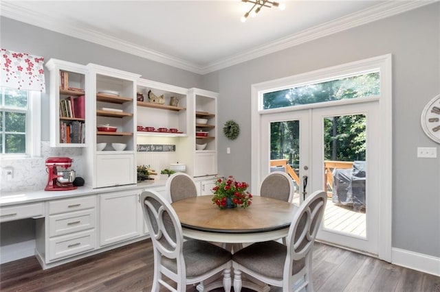9102 Magnolia Ct, Spanish Fort, AL 36527 - dining area featuring french doors, ornamental molding, and dark wood finished floors