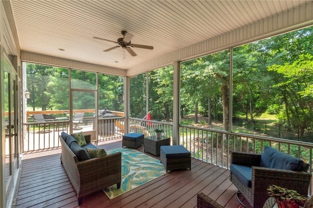 9102 Magnolia Ct, Spanish Fort, AL 36527 - wooden terrace with ceiling fan, outdoor lounge area, and view of wooded area