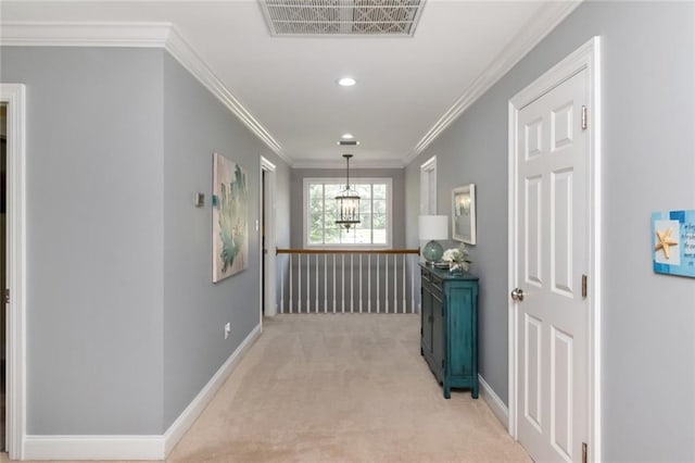 9102 Magnolia Ct, Spanish Fort, AL 36527 - corridor with light carpet, crown molding, baseboards, recessed lighting, and a chandelier