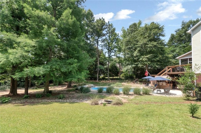 9102 Magnolia Ct, Spanish Fort, AL 36527 - view of grassy yard featuring a patio area, an outdoor pool, and view of scattered trees