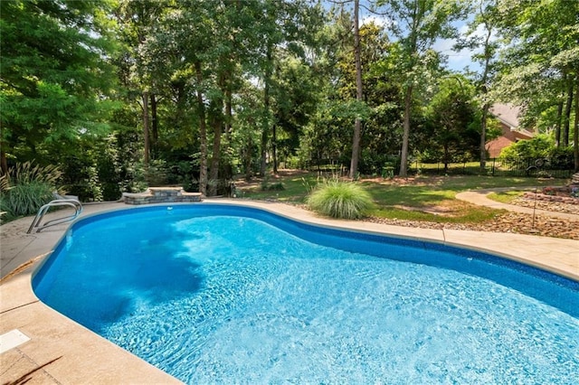 9102 Magnolia Ct, Spanish Fort, AL 36527 - swimming pool with view of scattered trees