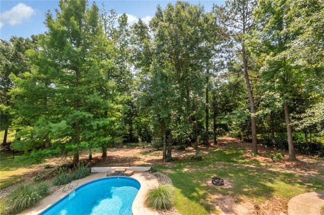 9102 Magnolia Ct, Spanish Fort, AL 36527 - swimming pool featuring a fire pit