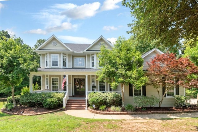9102 Magnolia Ct, Spanish Fort, AL 36527 - view of front of property with covered porch and a front yard