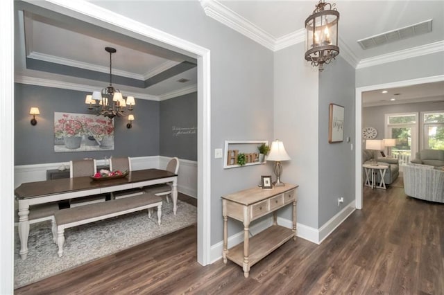 9102 Magnolia Ct, Spanish Fort, AL 36527 - dining room with a chandelier, dark wood finished floors, ornamental molding, and baseboards