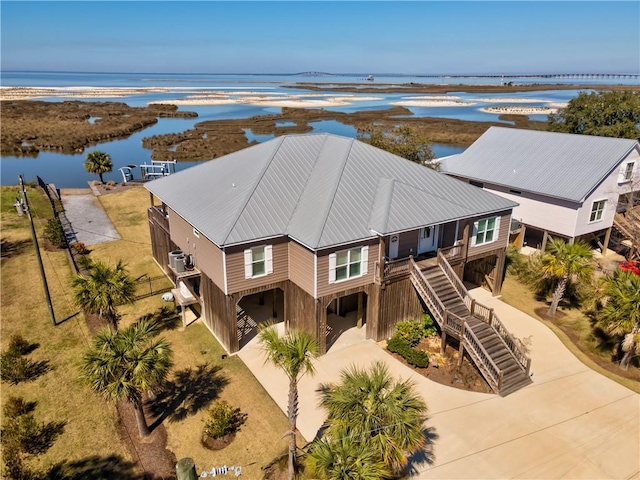 bird's eye view with a water view