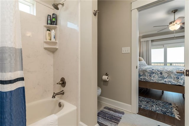 full bathroom with baseboards, connected bathroom, toilet, ceiling fan, and shower / bathtub combination with curtain