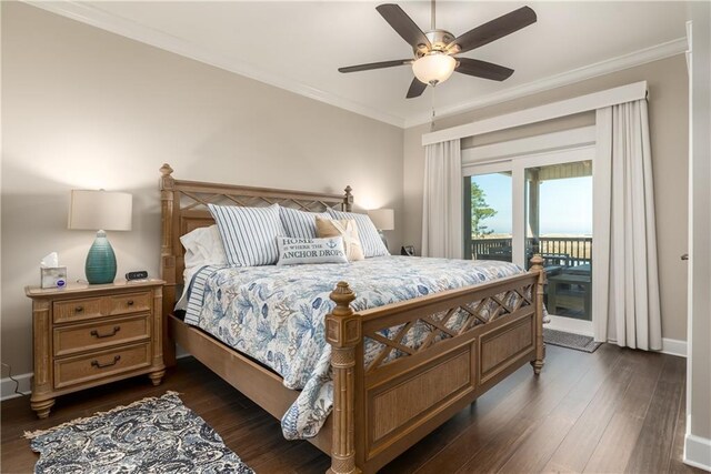 bedroom with access to outside, dark wood finished floors, crown molding, and baseboards