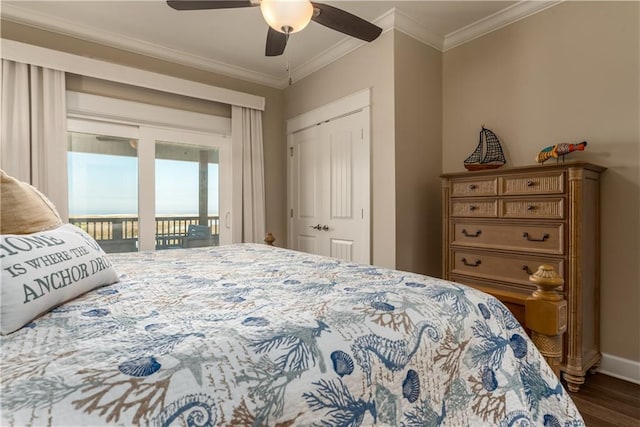 bedroom featuring baseboards, ceiling fan, wood finished floors, access to exterior, and crown molding