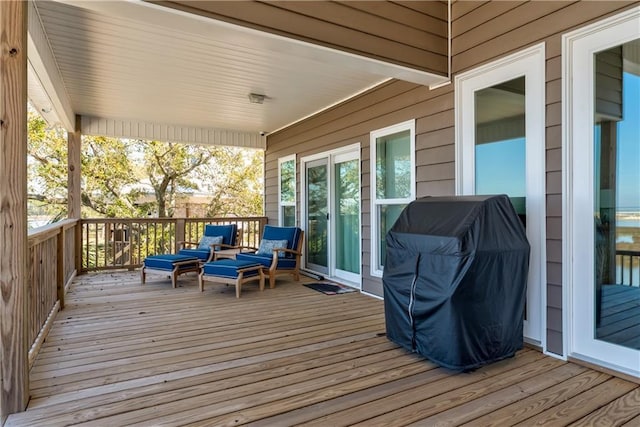 wooden deck with area for grilling