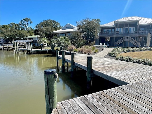 view of dock with a water view