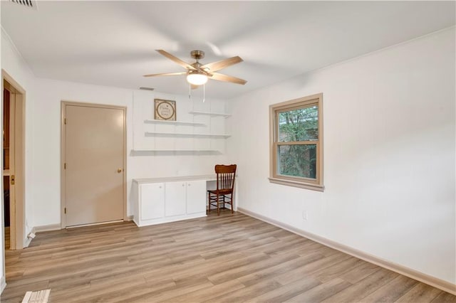 unfurnished living room with ceiling fan and light hardwood / wood-style floors