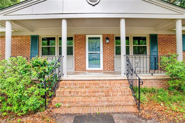 doorway to property with covered porch