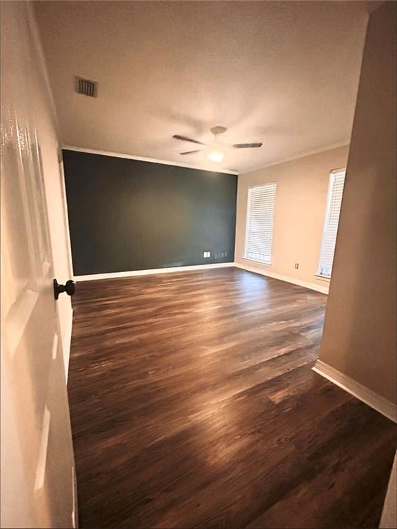 empty room featuring dark hardwood / wood-style floors