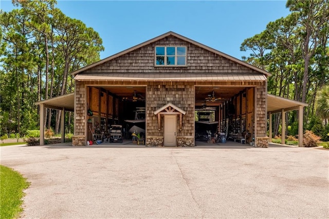 view of home's exterior with an outbuilding and a garage