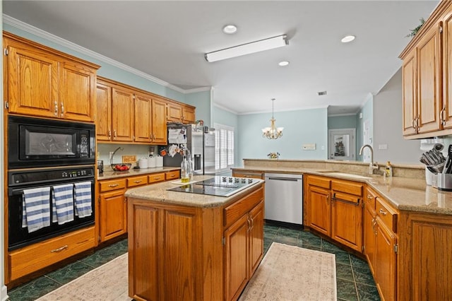 6905 Providence Estates Dr N, Mobile, AL 36695 - kitchen with black appliances, a peninsula, a chandelier, crown molding, and light stone counters