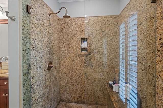 6905 Providence Estates Dr N, Mobile, AL 36695 - bathroom with tiled shower, vanity, and crown molding