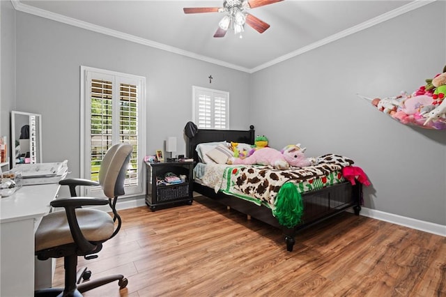 6905 Providence Estates Dr N, Mobile, AL 36695 - bedroom with ornamental molding, light wood-style flooring, a desk, and ceiling fan