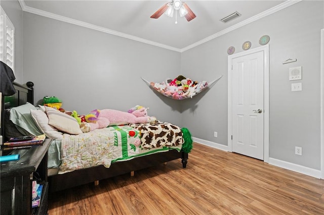6905 Providence Estates Dr N, Mobile, AL 36695 - bedroom featuring wood finished floors, crown molding, and a ceiling fan
