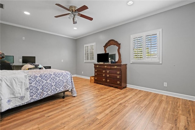 6905 Providence Estates Dr N, Mobile, AL 36695 - bedroom with multiple windows, ornamental molding, wood finished floors, recessed lighting, and ceiling fan