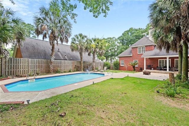 6905 Providence Estates Dr N, Mobile, AL 36695 - view of pool with a patio, a fenced backyard, and a fire pit