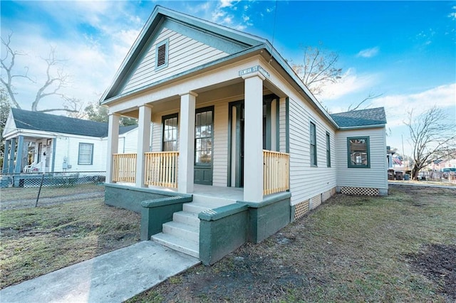 view of front of home featuring covered porch