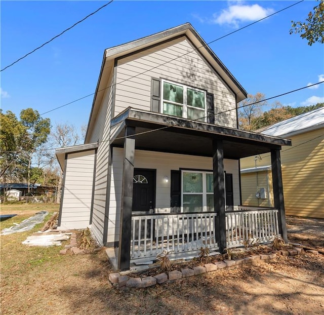 view of front of property featuring covered porch