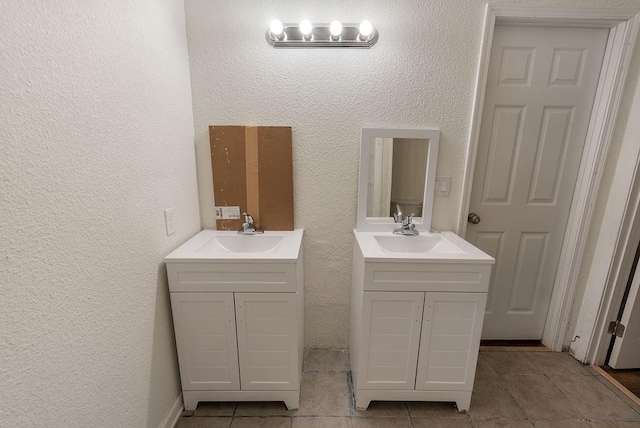 bathroom with vanity and tile patterned floors