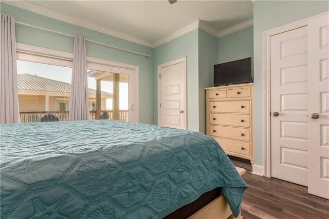 bedroom with ornamental molding, access to exterior, baseboards, and dark wood-style floors