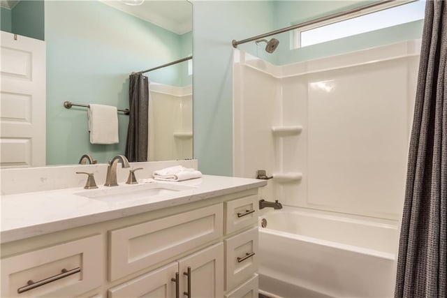 full bathroom with shower / bath combo with shower curtain and vanity