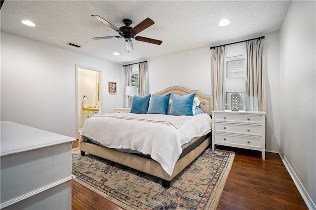 bedroom featuring recessed lighting, a textured ceiling, and visible vents