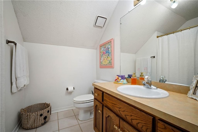 full bathroom featuring tile patterned floors, vaulted ceiling, toilet, vanity, and a textured ceiling