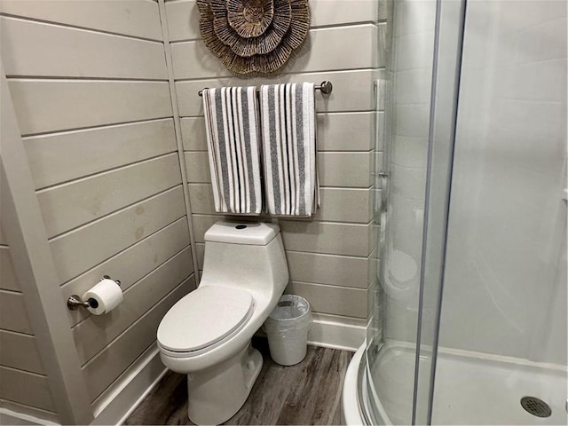 1401 Osprey Ln, Dauphin Island, AL 36528 - full bath with toilet, a shower stall, and wood finished floors