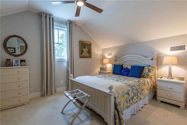 bedroom featuring lofted ceiling, light colored carpet, ceiling fan, and baseboards