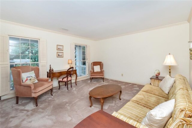 living room featuring carpet and ornamental molding