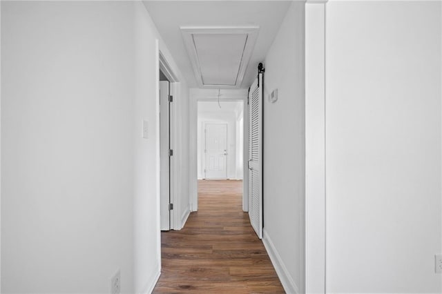 hall with dark hardwood / wood-style floors