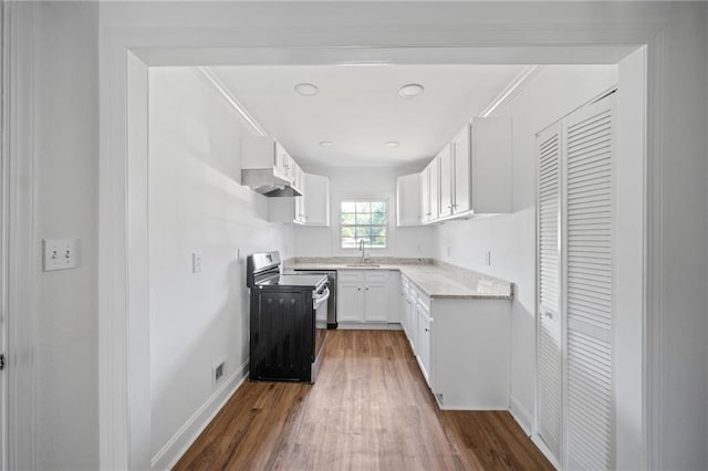 kitchen with white cabinetry, stainless steel range oven, dark hardwood / wood-style floors, and sink