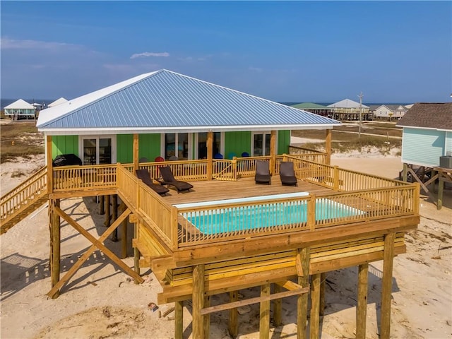 view of swimming pool with a wooden deck