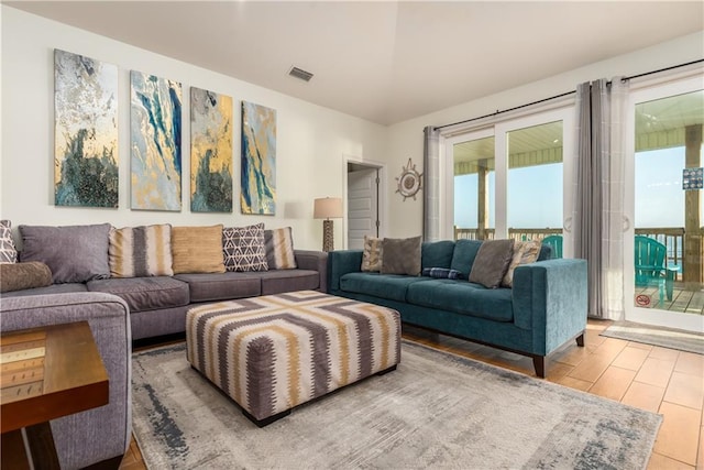 living room featuring visible vents