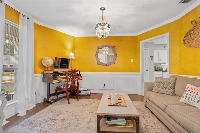 office space with crown molding, dark hardwood / wood-style floors, and an inviting chandelier