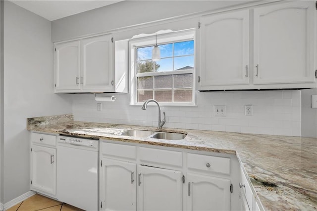 kitchen featuring white cabinetry and dishwasher