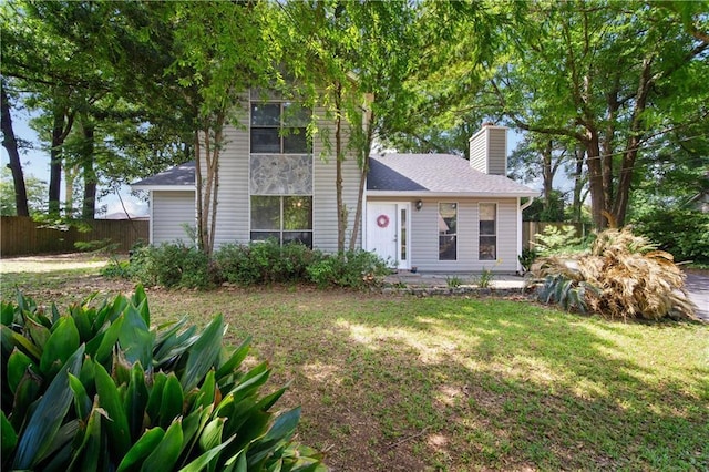 9731 Hamilton Creek Dr S, Mobile, AL 36695 - view of front of home featuring a chimney and a shingled roof