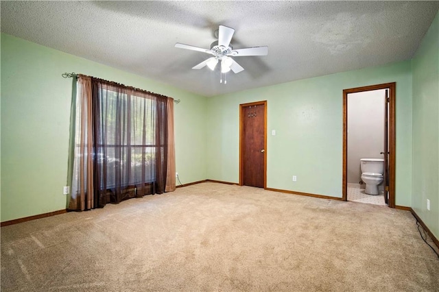 9731 Hamilton Creek Dr S, Mobile, AL 36695 - unfurnished bedroom featuring light carpet, baseboards, and a textured ceiling