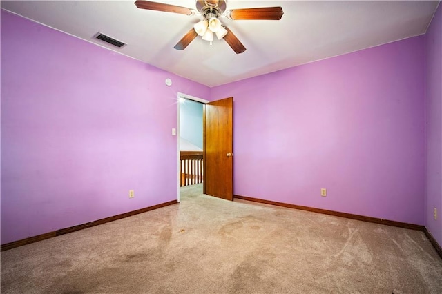 9731 Hamilton Creek Dr S, Mobile, AL 36695 - empty room with carpet floors, ceiling fan, and baseboards