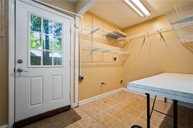 9731 Hamilton Creek Dr S, Mobile, AL 36695 - laundry room with baseboards, hookup for an electric dryer, hookup for a gas dryer, and washer hookup