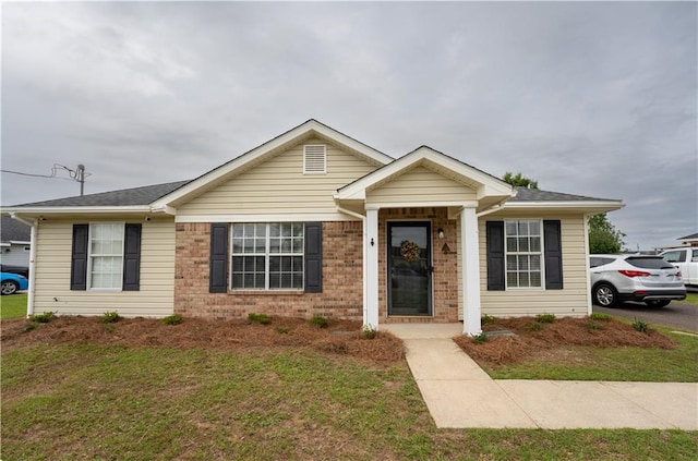 13330 Wages Ct, Mobile, AL 36695 - view of front of home with brick siding and a front lawn