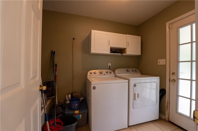 13330 Wages Ct, Mobile, AL 36695 - clothes washing area with cabinet space, independent washer and dryer, light tile patterned floors, and a textured ceiling