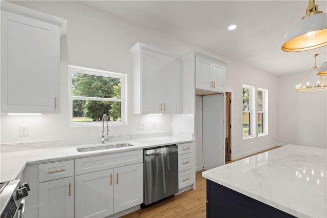 5305 Laurendine Rd, Theodore, AL 36582 - kitchen with stainless steel appliances, white cabinetry, light wood finished floors, decorative light fixtures, and recessed lighting