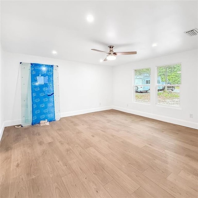 7498 Pinehill Rd, Daphne, AL 36526 - unfurnished room featuring light wood-type flooring, ceiling fan, and recessed lighting