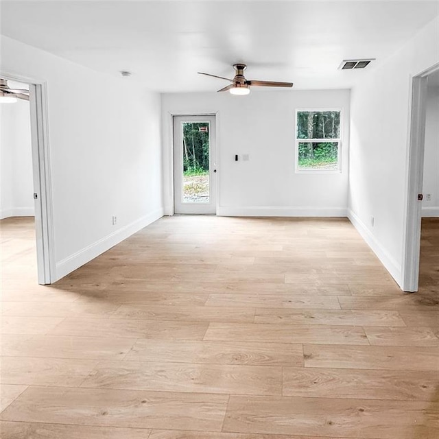 7498 Pinehill Rd, Daphne, AL 36526 - unfurnished room featuring a ceiling fan and light wood-style flooring